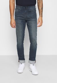 Blend - BHTWISTER FIT COATED - Slim fit jeans - denim dark blue Miniatuurafbeelding 1