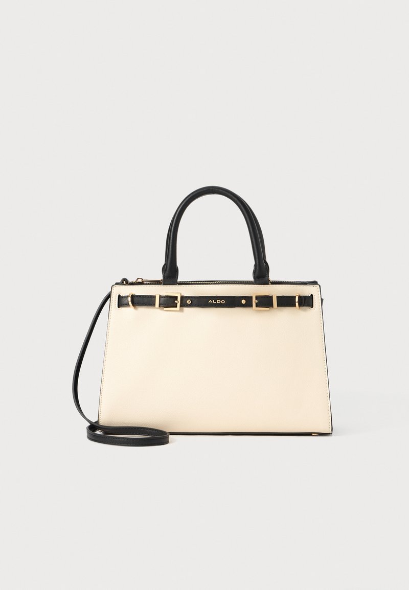 Beige strukturierte Handtasche mit schwarzen Akzenten, ausgestattet mit doppelten Griffen, einem abnehmbaren Schulterriemen und Details aus goldfarbigem Metall.