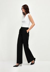 adL WIDE  - Pantaloni - striped black