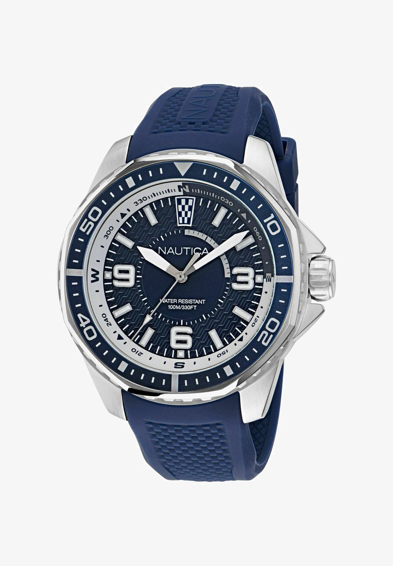 Nautica kellaga roostevabast terasest korpus, tume sinine kummirihm, tekstureeritud tumesinine kellapaneel, suured araabia numbrid ja veekindluse hinnang 100m.