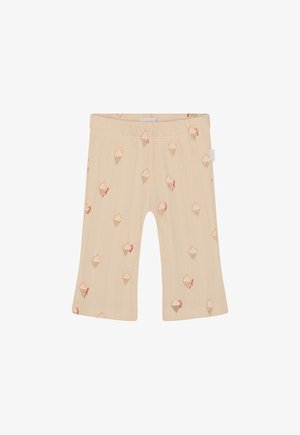 Leggings beiges côtelés avec un motif intégral de cornets de glace aux couleurs pastel. Taille élastique et coupe courte.