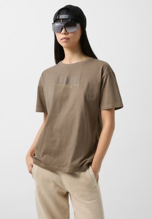 CARA - T-shirt imprimé - khaki