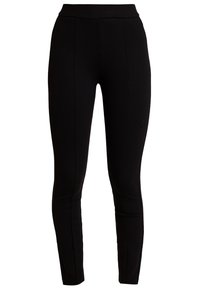 Černé legíny s vysokým pasem, vyrobené z elastického materiálu. Obsahují vertikální švy pro přiléhavý siluetu. Hladká textura po celé ploše.