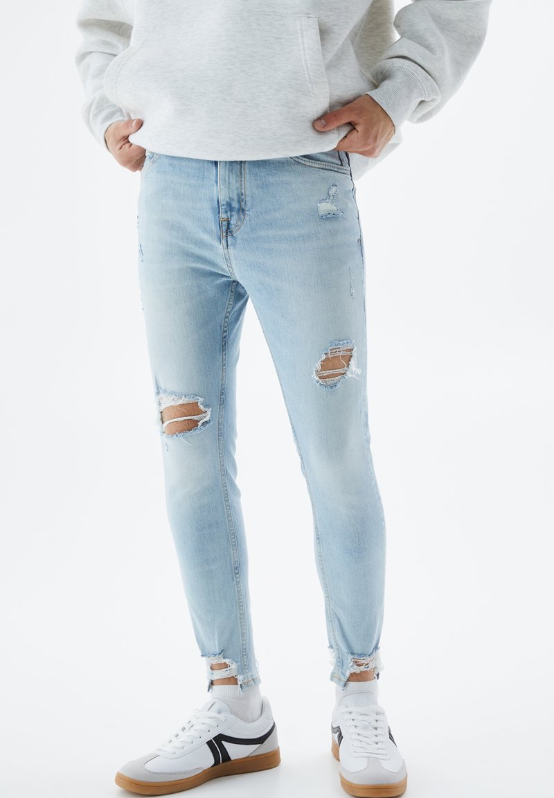 PULL&BEAR RIPPED Jeans Straight Leg light blue/hellblau Zalando.at