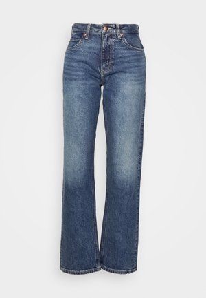 Jeans a vita alta e gamba larga realizzati in denim blu scuro con una finitura sbiadita. Presentano bottoni di tonalità rame e tasche cucite.