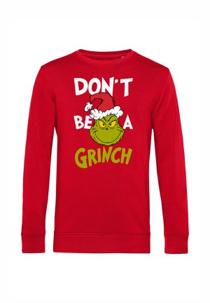 Červená mikina s dlouhým rukávem s bílým a zeleným nápisem "NEBUĎ GRINCH" a ilustrací Grinche s vánoční čepicí. Bavlněný materiál.