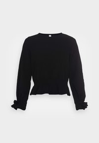 Top lungo nero a maniche lunghe realizzato in tessuto morbido, con vita arricciata e dettagli legati ai polsini. Collo rotondo semplice e vestibilità comoda.