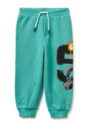 Kinder joggingbroek in blauwgroen met witte trekkoord, geribbelde boorden en zwarte grafische print met koptelefoon op het rechterbeen.