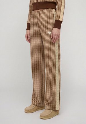 Hummel, PEPITA CHEVRON TAPE TRACKPANTS - Pantalon de survêtement - dark brown beige