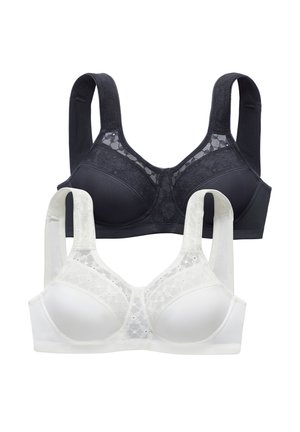Two lace-trimmed, wireless bras in black and white, featuring wide straps and seamless molded cups for comfort and support.