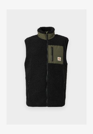 Svart fleecväst med hög krage, grön bröstficka, sidodragkedjor och märkeslogo. Mjuk textur och ärmlös design.