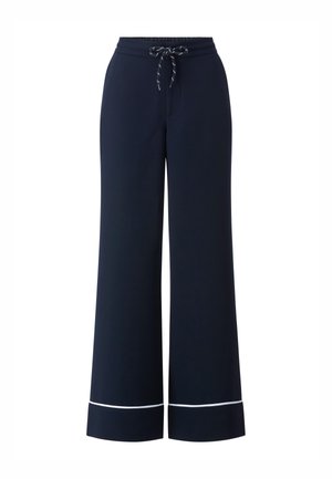 Pantaloni larghi color blu navy realizzati in tessuto morbido, con vita elastica e coulisse, rifiniti con bordo bianco ai polsini. Design casual.
