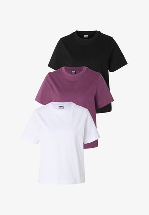 Trois T-shirts unis à col rond empilés, couleurs de l'avant vers l'arrière : blanc, violet et noir, présentés sur fond blanc.