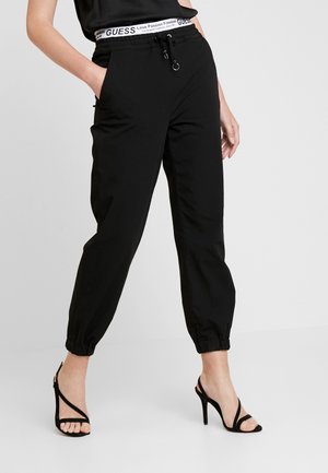 Pantalones deportivos - black