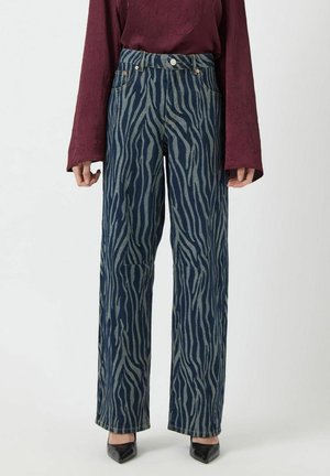 Hoge taille wijd been jeans in donkerdenim met een lichtblauwe zebra-strikpatroon. Voorzien van een metalen knoop en klinknagels, met rechte, schone zoom.