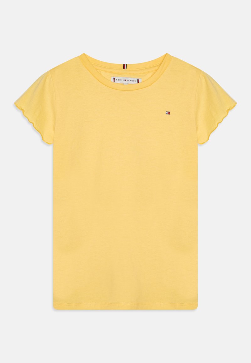T-shirt amarelo de algodão com mangas curtas e em forma de onda. Apresenta um pequeno logótipo no peito. Decote redondo e bainha reta.