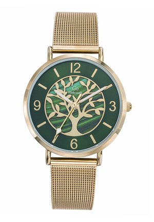 Gold-tone metal mesh watch featuring a green dial with a tree design, gold accents, and clear hour markers. Smooth, contemporary shape.