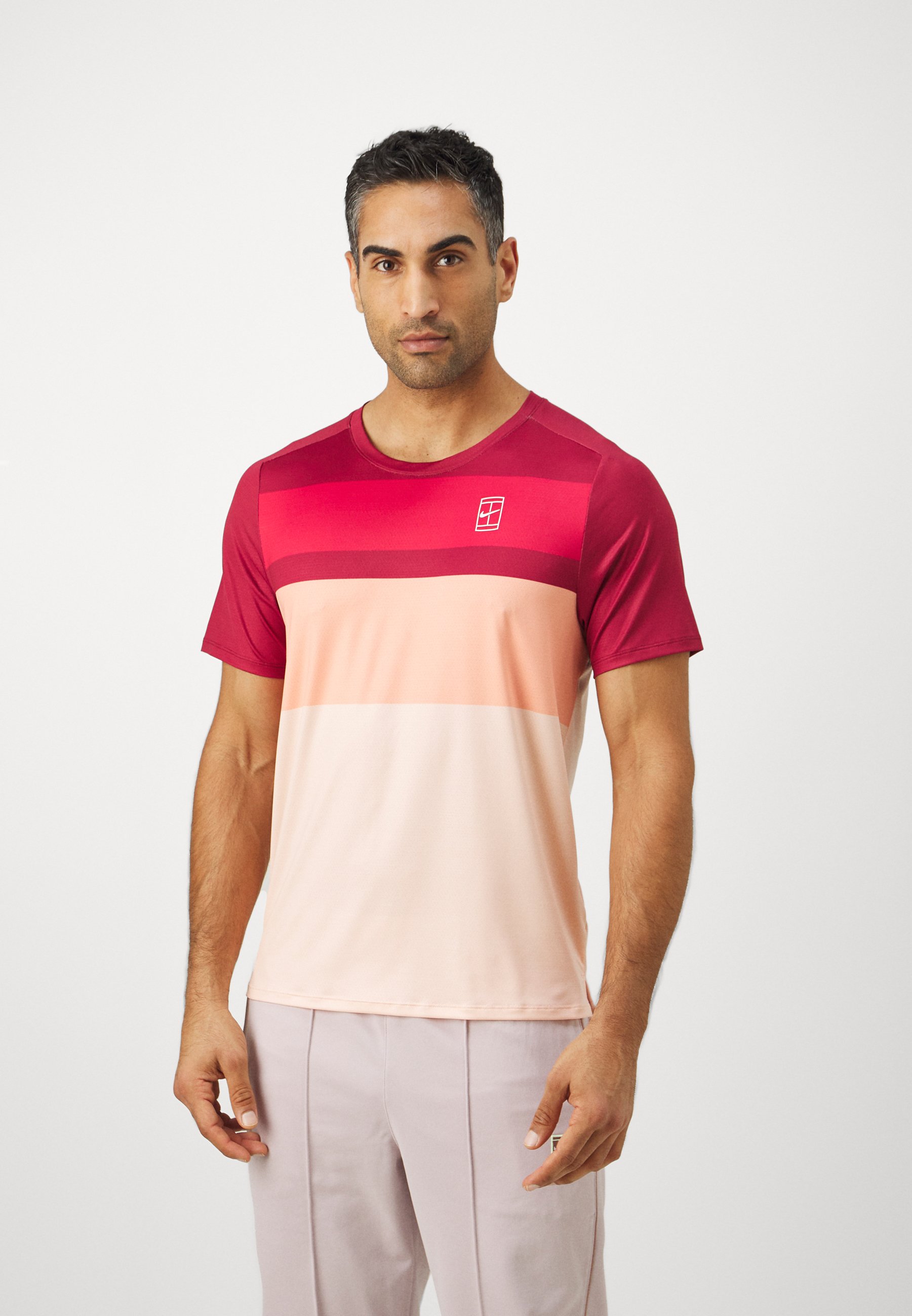 washed coral nike shirt