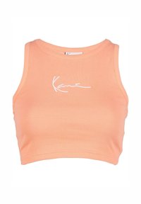 Bezramenný ribbed broskvový crop top s kulatým výstřihem a bílým vyšívaným logem "Kani" umístěným na hrudi.
