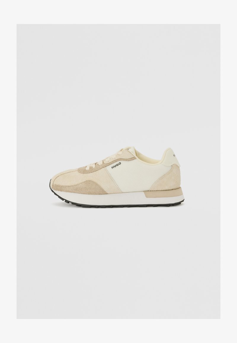 Beige sneakers with textured suede and mesh panels, featuring a white sole and light laces. Marked with "HUGO" on the side.