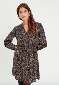Black dress with a floral pattern in red, white, and yellow. Features long sleeves, a cinched waist, and a buttoned neckline.