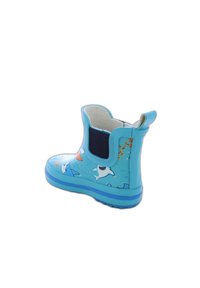 Bottes en caoutchouc bleues pour enfants avec des motifs de requins, une finition texturée, un panneau élastique et un talon renforcé pour un enfilage facile.