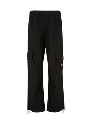 Black cargo pants made of fabric with an elastic waistband, two large side pockets, and adjustable cuffs with drawstrings.