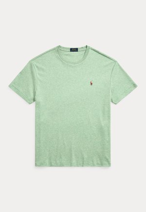 Heleroheline lühikeste varrukatega Polo Ralph Lauren T-särk ümmarguse kaelusega ja vasakul rinnal väikese tikitud hobuse logoga.