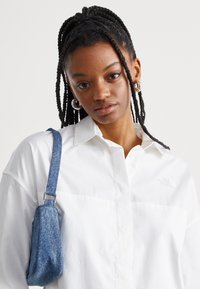 The North Face HIGH LOW - Pogājama blūze - white