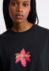 Santa Cruz WOOTEN BIONIC OVERSIZED - Marškinėliai su spaudiniu - black