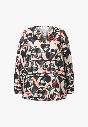 Lange mouwen blouse van beige stof met een gedurfde print van rode harten, zwarte schoppen en ruiten. V-hals ontwerp met een ontspannen pasvorm.