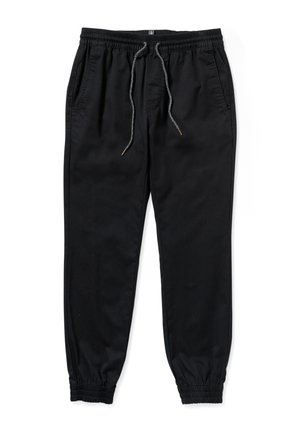 Zwarte joggingsbroek met een elastische tailleband, koord, zijzakken en elastische boorden. Gemaakt van een gladde stof met een lichte glans.