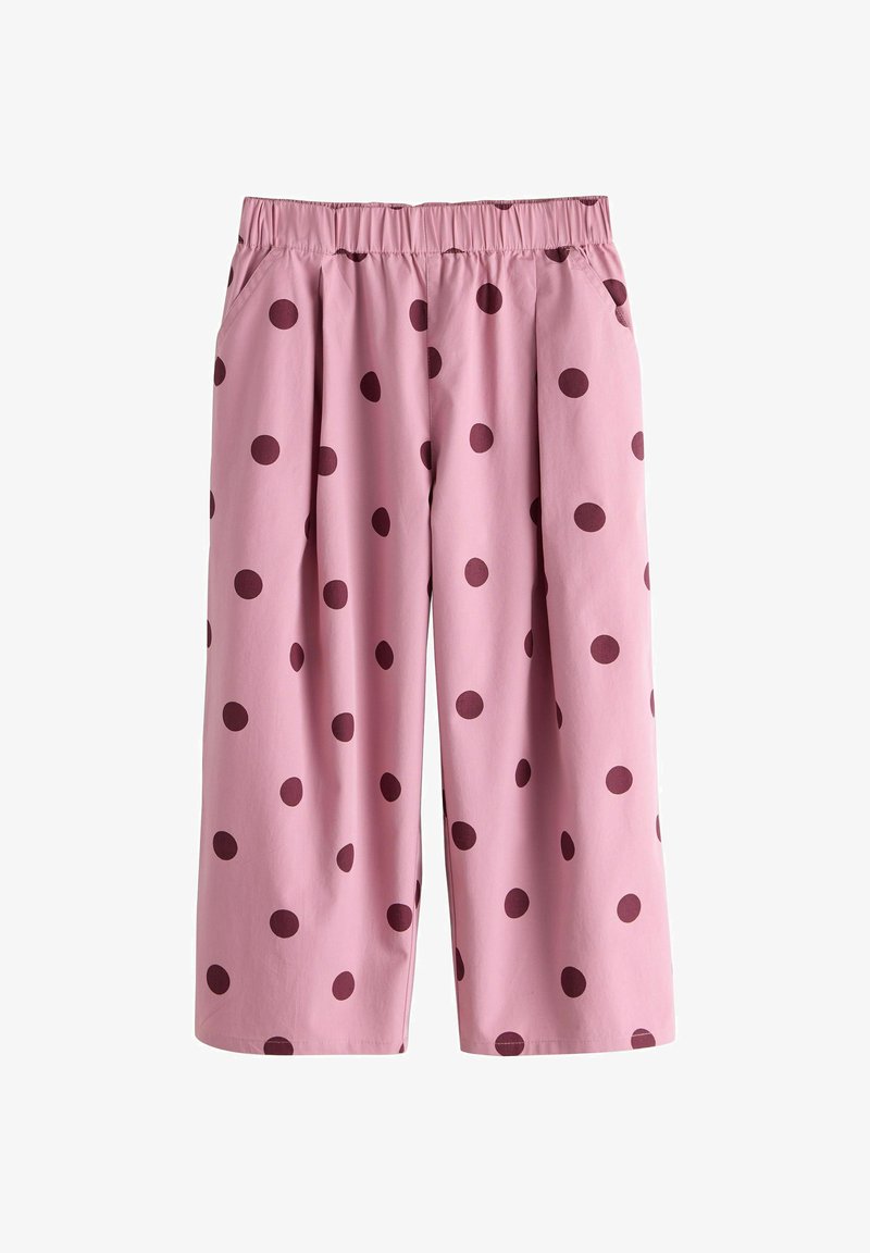 Pantalon rose à jambes larges avec des pois violet foncé, taille élastique et poches latérales.