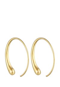 Orecchini a cerchio in oro con un design morbido e curvo, caratterizzati da una punta arrotondata. La superficie è lucida, creando una qualità riflettente.