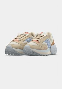 Beige athletic shoes with light blue and coral accents. Suede and mesh upper, textured rubber sole, and lace-up fastening.