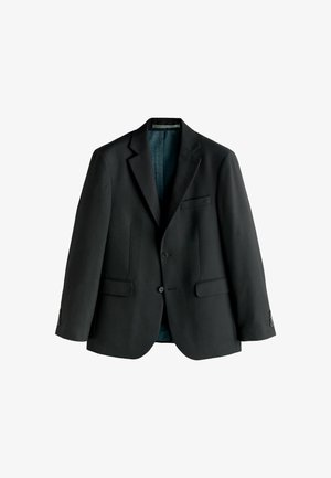 Čierne sako s jednoradovým zapínaním, s vrúbkovanými klopami, dvoma prednými vreckami a zapínaním na gombíky. Podšité kontrastnou modrou látkou.