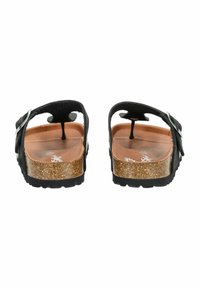 Black open-back sandals with a cork footbed, adjustable strap, flat rubber sole, and smooth leather-like material.