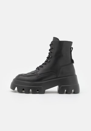 Stivaletti con plateau - black