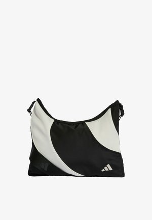 Černobílá kabelka přes rameno s vlnkovým vzorem, vyrobená z odolného nylonu. Má strukturovaný povrch a logo v dolním rohu.