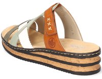 Sandale en cuir marron et vert avec une semelle en liège, présentant des sangles multicolores, des bords festonnés et des coutures décoratives. Design courbé.