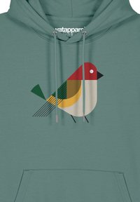 Hoodie teal présentant un graphique d'un oiseau stylisé en rouge, vert, jaune et crème, avec des formes géométriques et de fines lignes noires accentuant le design.