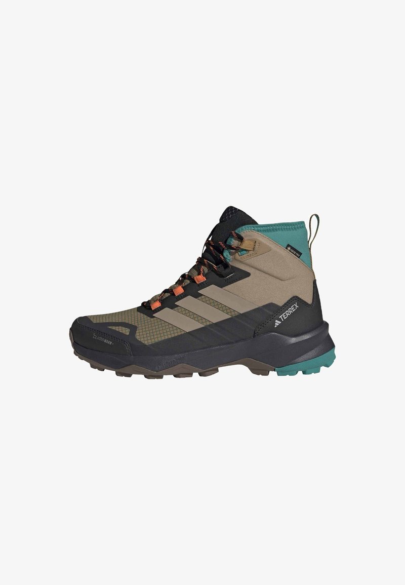 Outdoor hiking boot in beige, black, and teal with orange accents, featuring waterproof Gore-Tex and rugged sole for rough terrain.