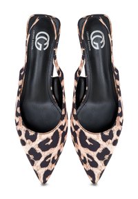Leopard print slingback heels with a pointed toe, fabric upper, black inner lining, and a cutout heel design. Silver logo detail visible.