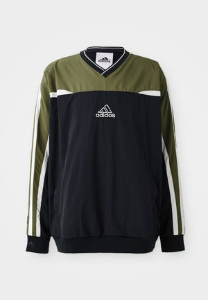 Adidas genser i svart og olivengrønn, med v-hals, hvite detaljer og logo i midten. Laget av lett materiale.