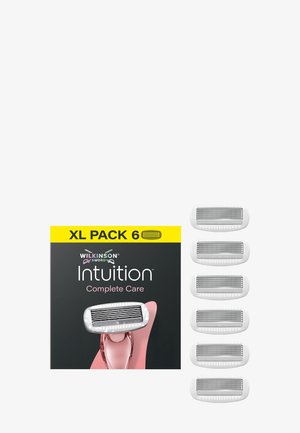 Wilkinson Sword Intuition Complete Care -parranajokone, jossa yksi kiinnitetty terä, sekä viisi vaihtoterää XL-pakkauksessa.