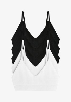 Stack of five seamless bralette tops with thin straps, three black and two white, arranged vertically on a white background.