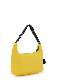 Bolso de hombro de tela amarilla con una correa ajustable negra, forma redondeada, cierre con cremallera y detalle de tela texturizada.