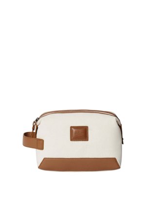Canvas pouch with a cream body, brown leather accents, zip closure, and a side handle for easy carrying. Features a logo patch on the front.
