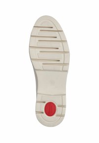 Semelle de chaussure blanche en caoutchouc avec des rainures horizontales texturées, un insert de coussin rouge circulaire proéminent et le numéro "37" estampillé sur la surface.