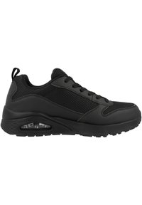 Scarpe da ginnastica nere con tomaia in rete, suola in gomma solida e ammortizzazione d'aria visibile nel tallone. Presentano lacci e un'etichetta di apertura.